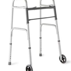 Medline walker with 5" casters and 2-button folding (excellent Like New Condition)