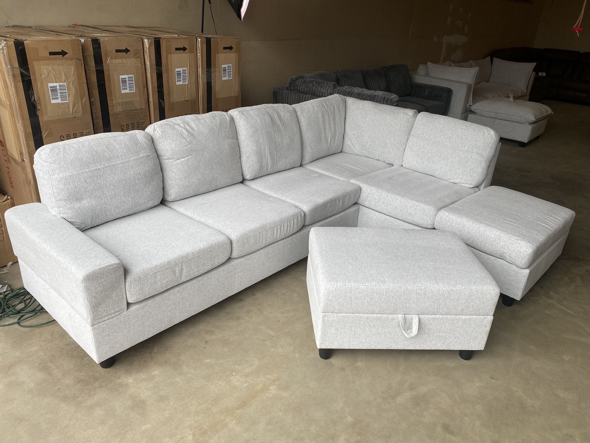 FREE DELIVERY AND INSTALLATION - Brand New in box gray Sectional and Ottoman (Look my profile)