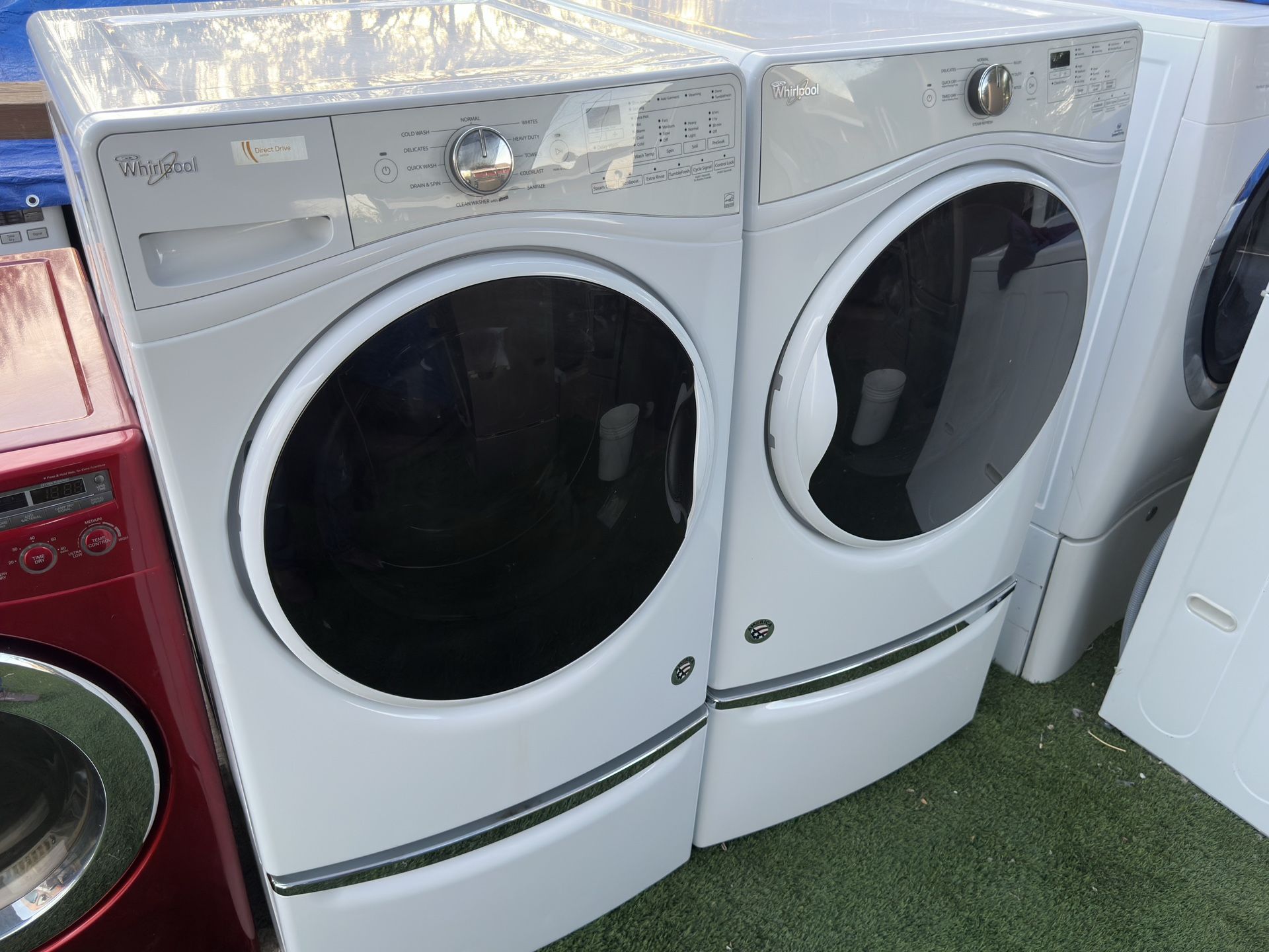 Whirlpool Front Load Washer And Electric Dryer On Pedestals