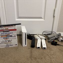 Nintendo Wii w/ Games +Controls+RockBand Accessories 