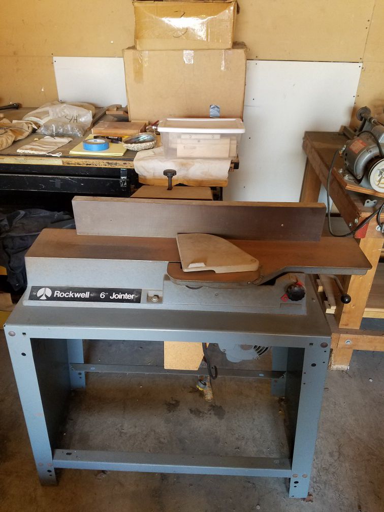 Craftsman miter/chop saw, industrial vacume, dehumidifier, antique metal tilt top drafting table.
