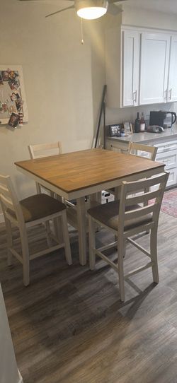 Rustic dining table and four chairs