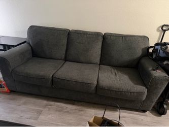 Matching gray sofa and loveseat