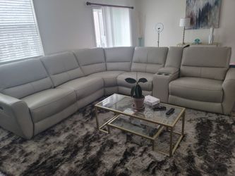 Leather sectional w/ recliners and coffee table