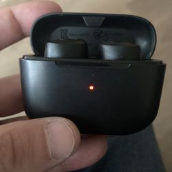 Black Jlab Bluetooth Earbuds. 