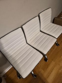(3) white chairs