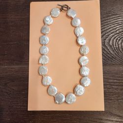 handmade freshwater baroque flat coin pearl necklace featuring lustrous, irregularly textured white pearls, good condition