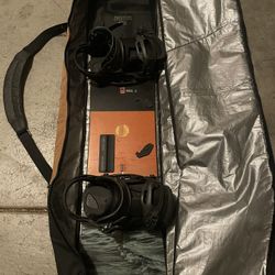 Burton Snowboard with EST Bindings & Bag