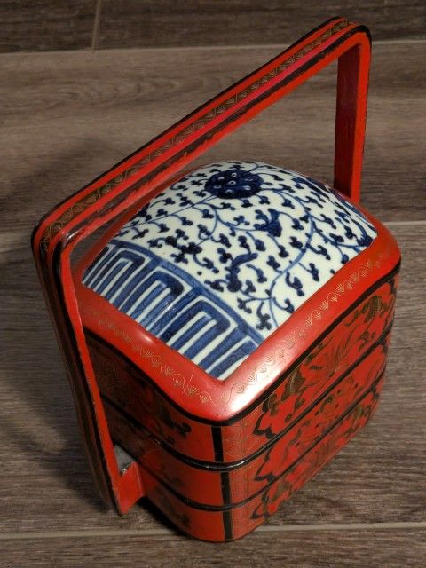 Antique Chinese Wedding/Lunch/Porcelain/Lacquer Box
Antique red lacquer ware Chinese stacked / tiered wedding lunch box ceramic top, handled.