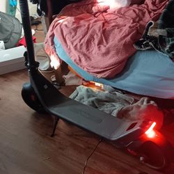 A Phantom gogo scooter a10 and a xbox 360 with 2 controller and Some Games