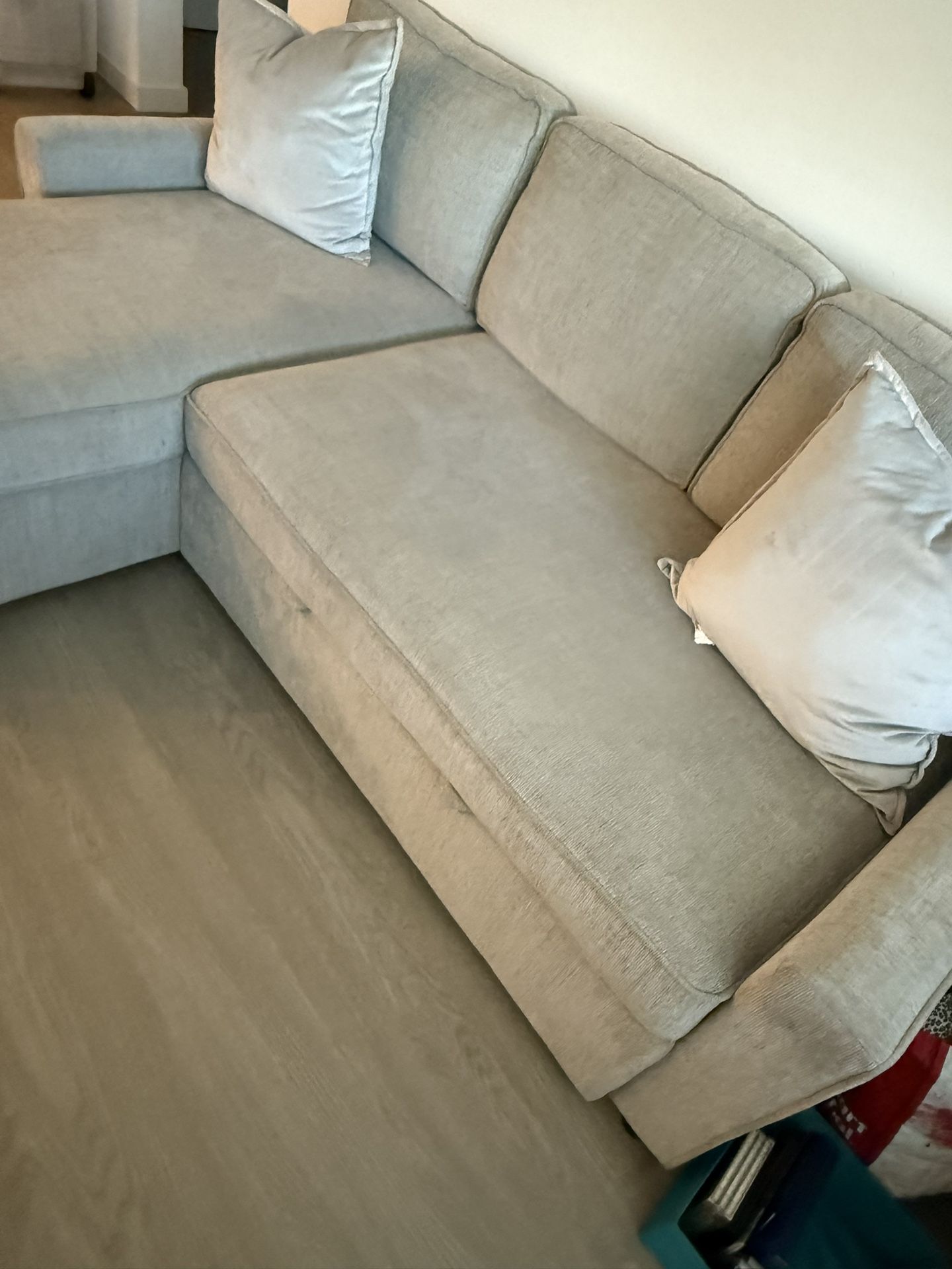 Light Grey Sleeper Sectional With Storage Chaise