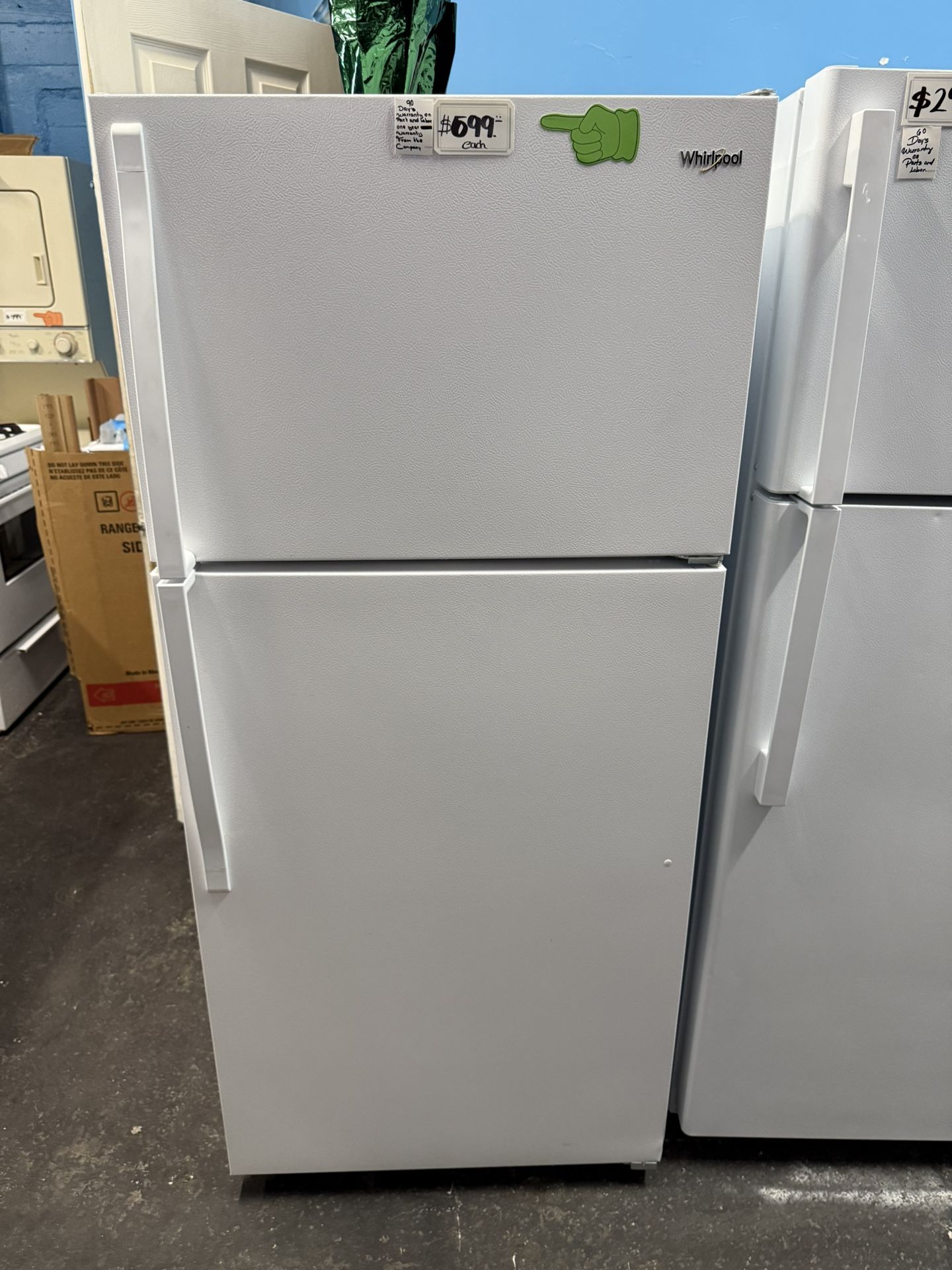 New open box whirlpool top and bottom refrigerator