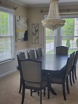 Dark Wood Dining Table with 8 Upholstered Chairs