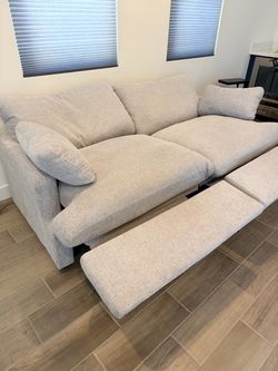 Gray power reclining sofa love seat