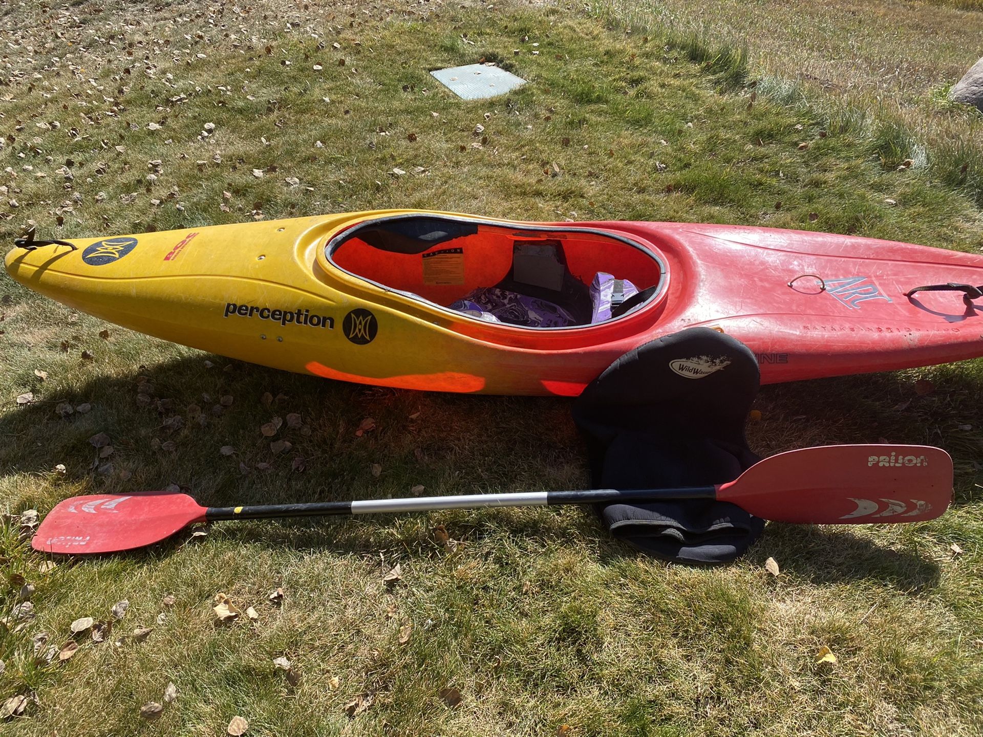 Perception Pro Line Kayak with skirt and paddle