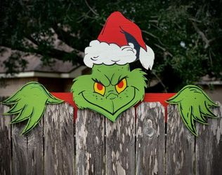 grinch over the fence