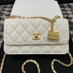 Chanel 23s Caviar clutch with chain & charm 