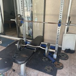 Weight set (bench, barbell, plates, & more)