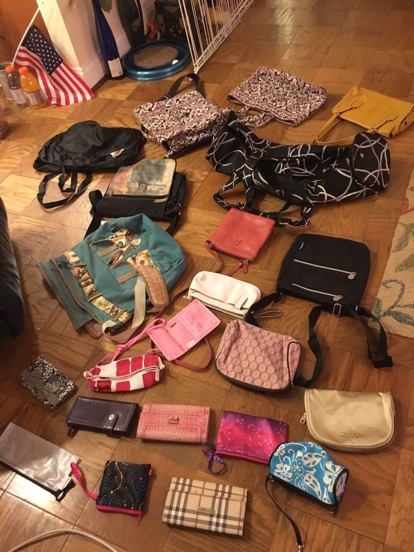 Various women’s purses, yoga bag, messenger totes, and wallets
