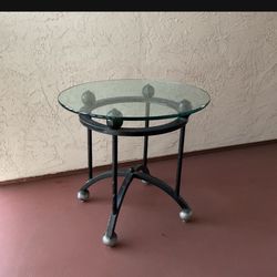 One Heavy Round Iron Table with Thick Glass Top