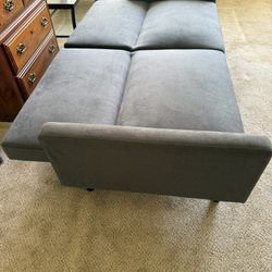 Futon. Never been used. It was used for a filler for my office. 