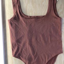 Women’s terracotta bodysuit size L