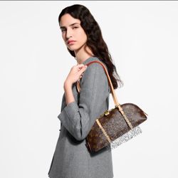 L.   V.   Squire East West bag