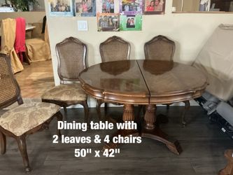 Dining table with 2 leaves & 4 chairs  -  $150