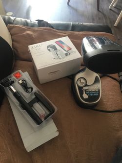 Plancha de vapor y antena para selfies