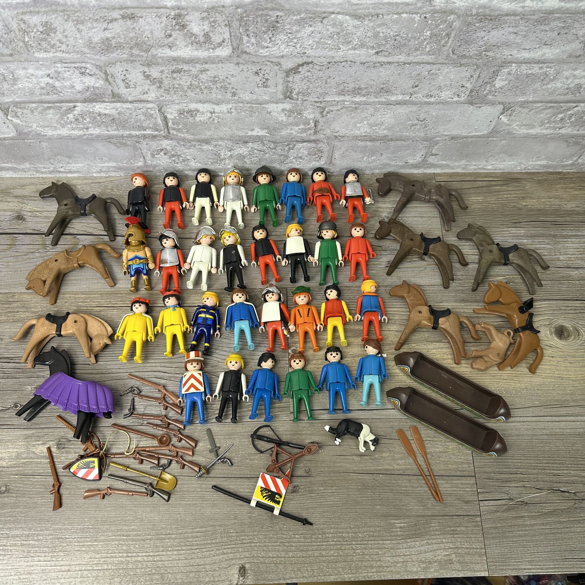 Lot Of 30 vintage playmobil figures 9 Horses Guns Weapons Dog Canoes 4026