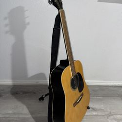 acoustic guitar with stand. 