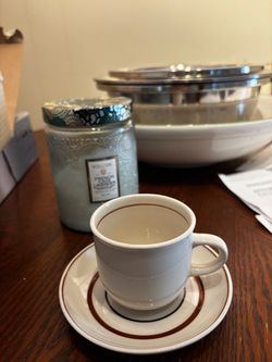 Countryside Stoneware Japan cups and saucers in a white ceramic with a brown rim