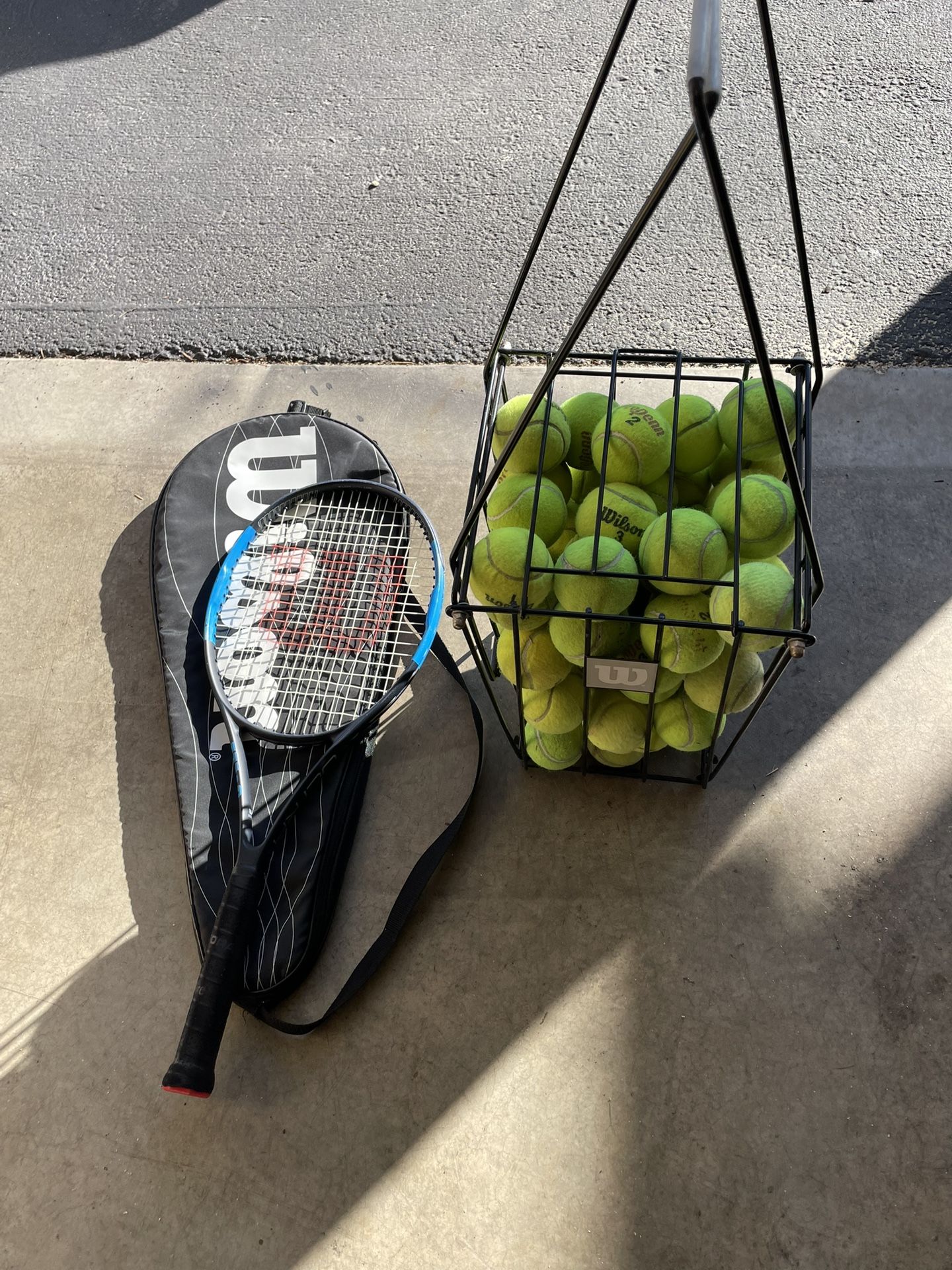 Tennis Ball Pick Up/wilson racket.