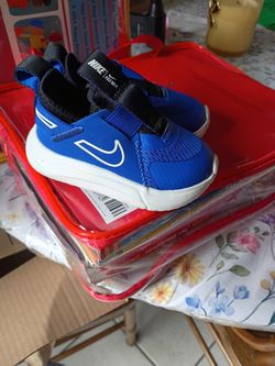 Infant boy 4c blue Nike slip on shoes