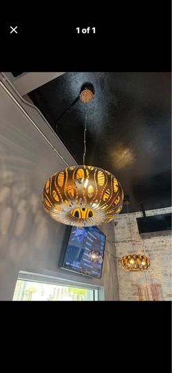 Two round decorative ceiling lights