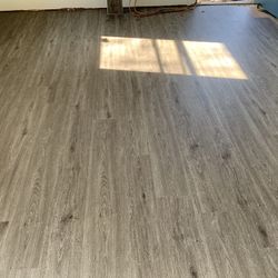 Laminate Vinyl And Baseboard