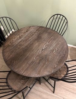 Round metal and wood table