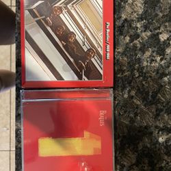 two beatles CDs 