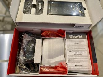 Nintendo Switch Bundle – Console Plus New Joy Cons Plus Ring Fit +4 Games And Accessories