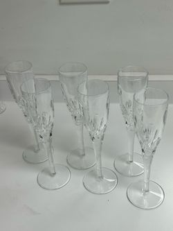 6 perfect Waterford champagne glasses $275.00