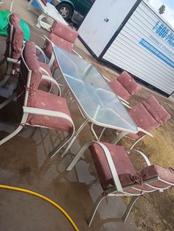 Patio furniture table and 6 chairs