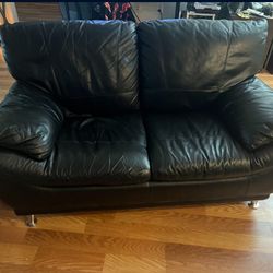 Black Leather Loveseat Sofa With 2 Foot Rests - Pembroke Pines Location