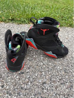 Men’s sneakers. Nike Jordan 7 Retro Barcelona night.