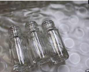 1/8 clear glass roll on with black cap