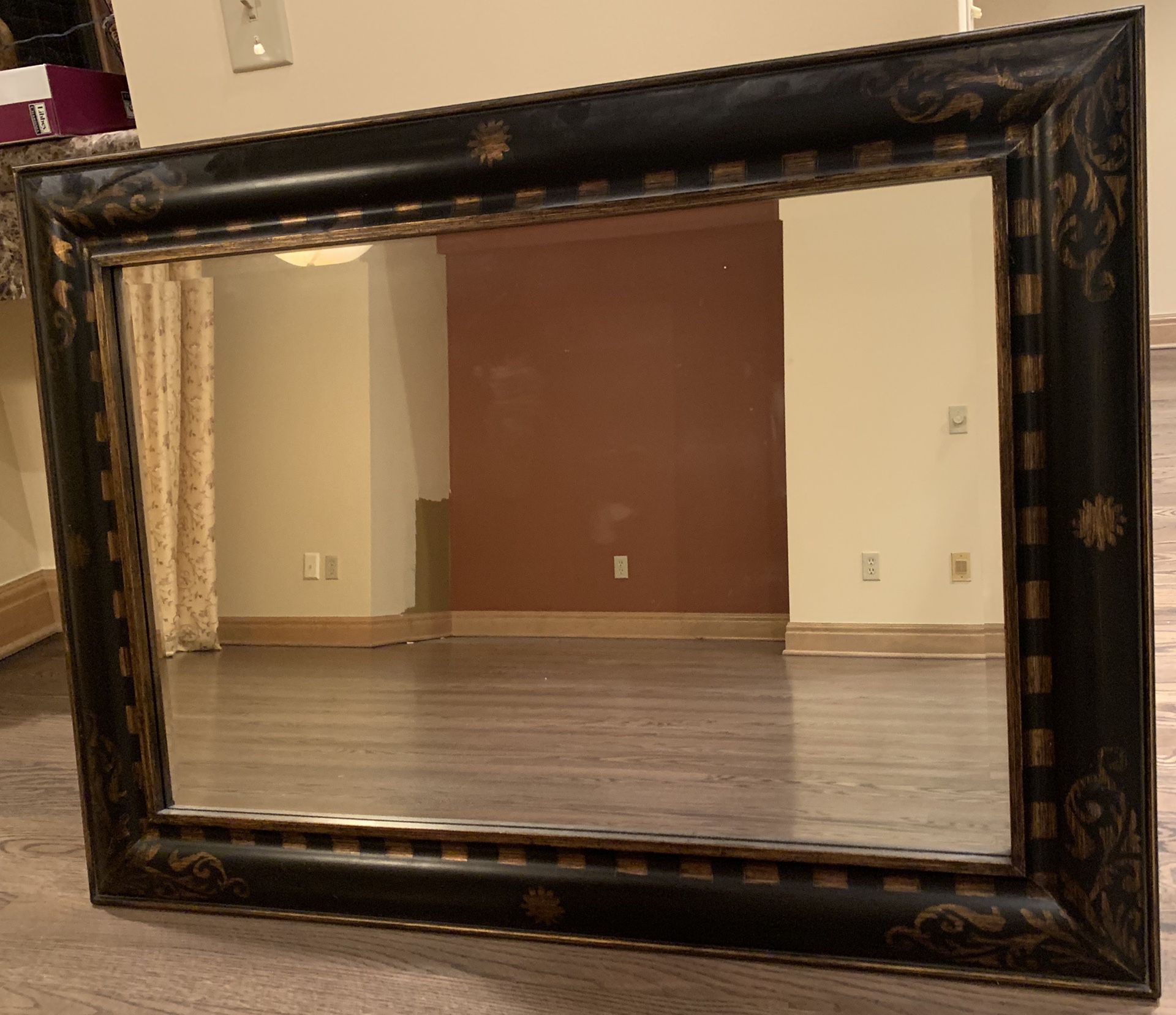 Beautiful 45 x 33 in large hanging mirror with gold and brown frame with accents