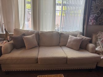 Sofa in cream color, deep and large but very comfortable.