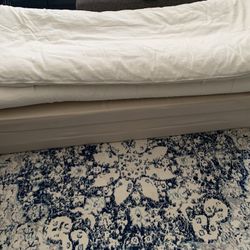 Great condition queen-size organic futon with tri-fold floor mat.