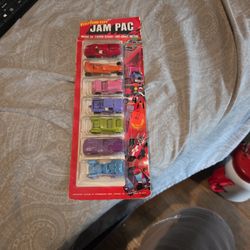 vintage Tootsietoy Jam Pac set of die-cast metal vehicles.