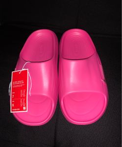 Pink Nike slides