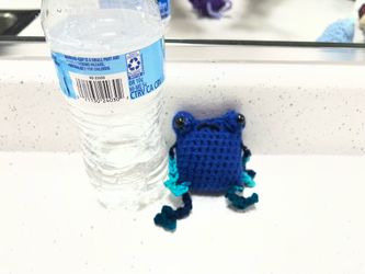 Handmade crochet frogs